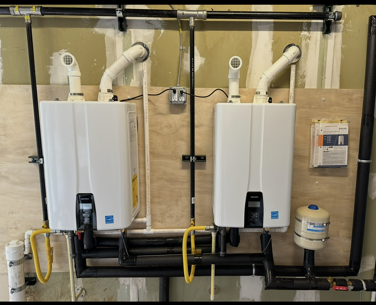 Professional gas supply piping serving dual tankless water heaters