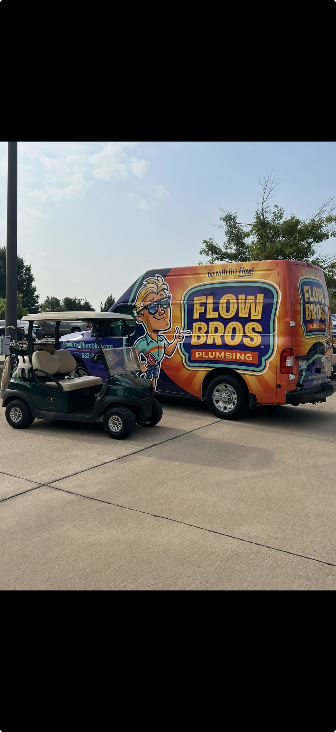 Flow Bros Plumbing service van at a charity golf tournament